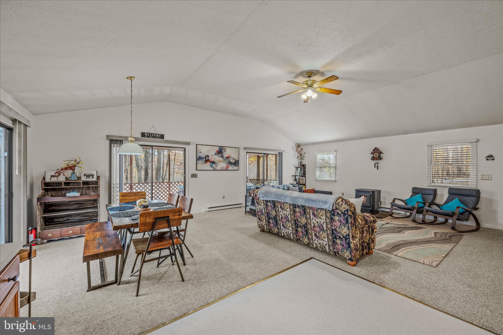 67 Tranquil Way Berkeley Springs, WV 25411 - Photo 8 of 37 a living room with furniture and a flat screen tv