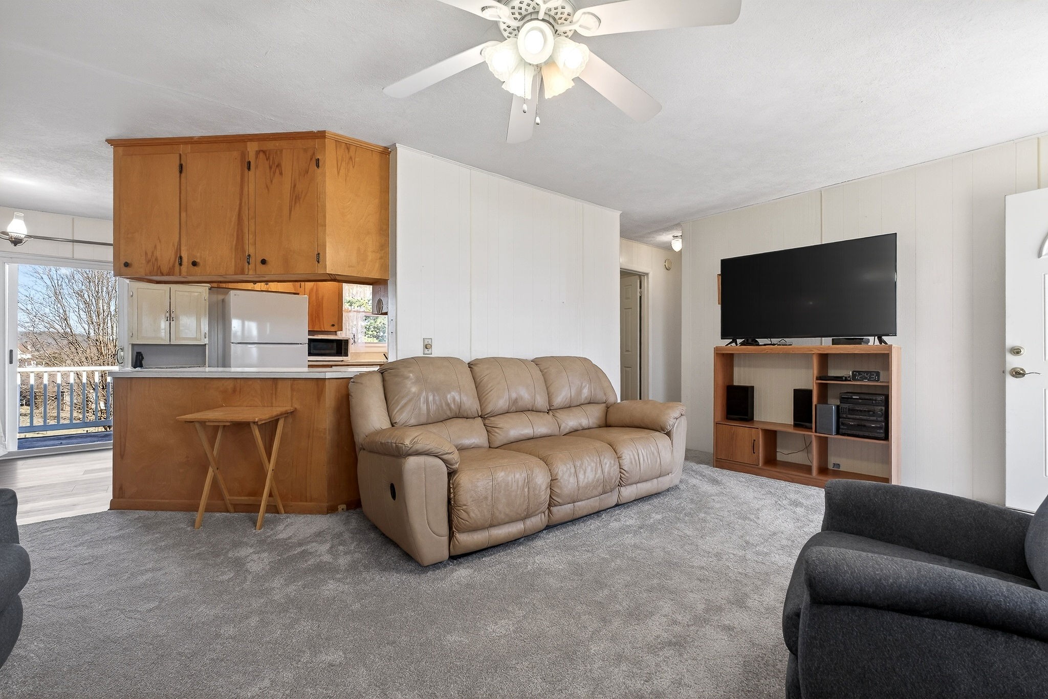 566 Turntable Road Sparta, TN 38583 - Photo 11 of 48 a living room with furniture and a flat screen tv