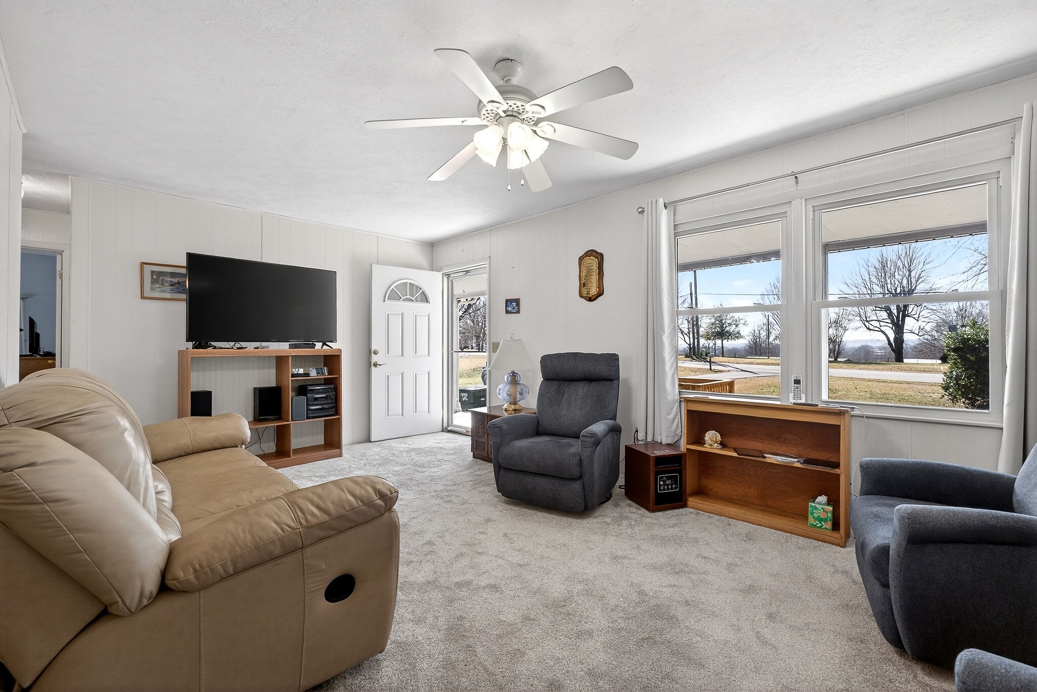 566 Turntable Road Sparta, TN 38583 - Photo 12 of 48 a living room with furniture and a flat screen tv