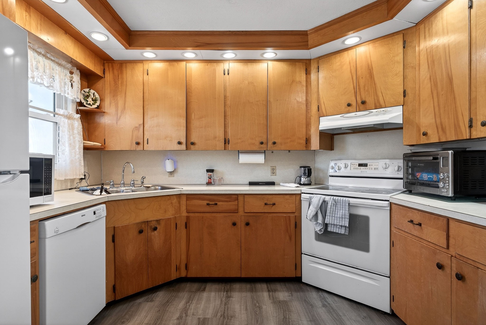 566 Turntable Road Sparta, TN 38583 - Photo 14 of 48 a kitchen with a sink cabinets and appliances