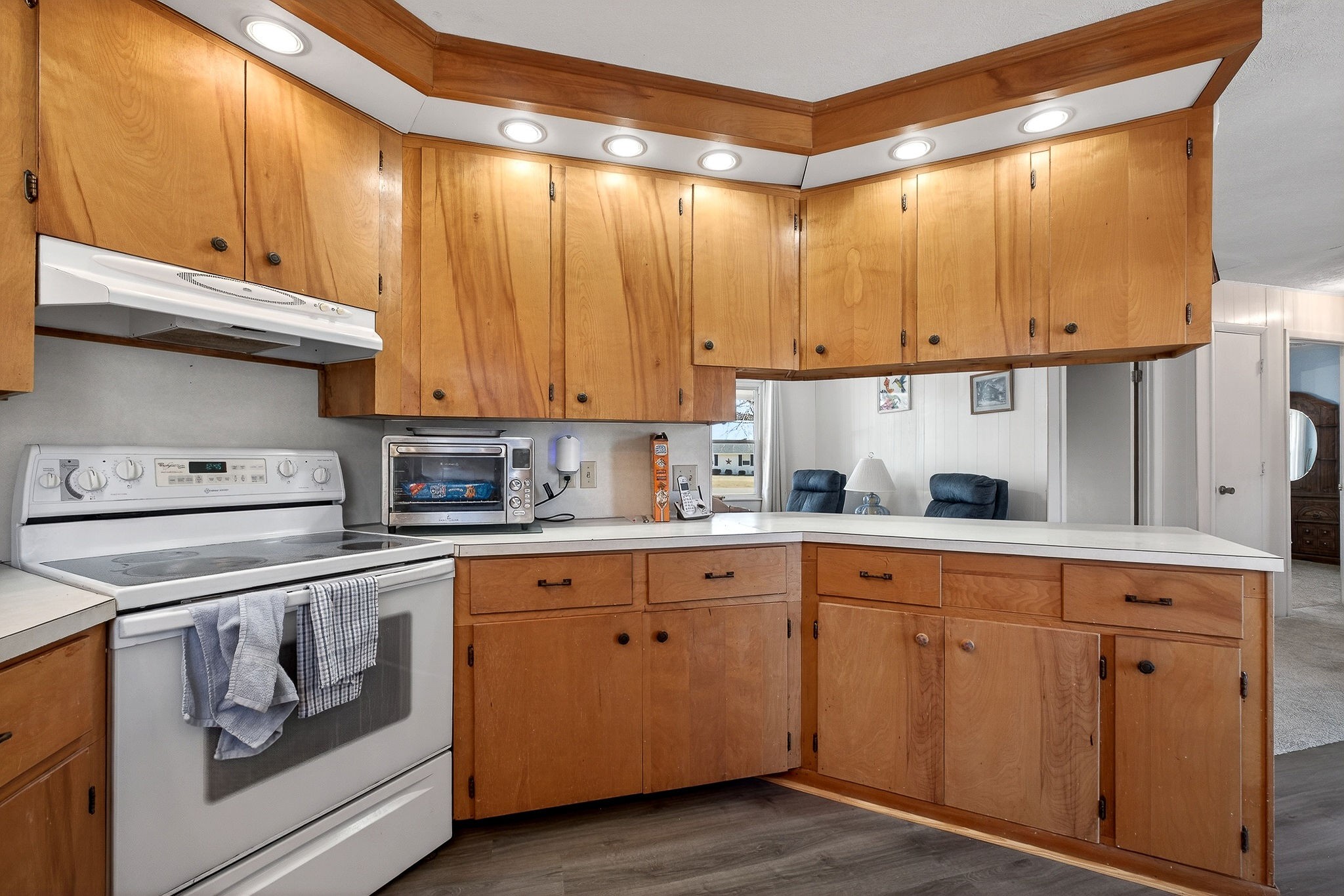 566 Turntable Road Sparta, TN 38583 - Photo 16 of 48 a kitchen with cabinets and white appliances