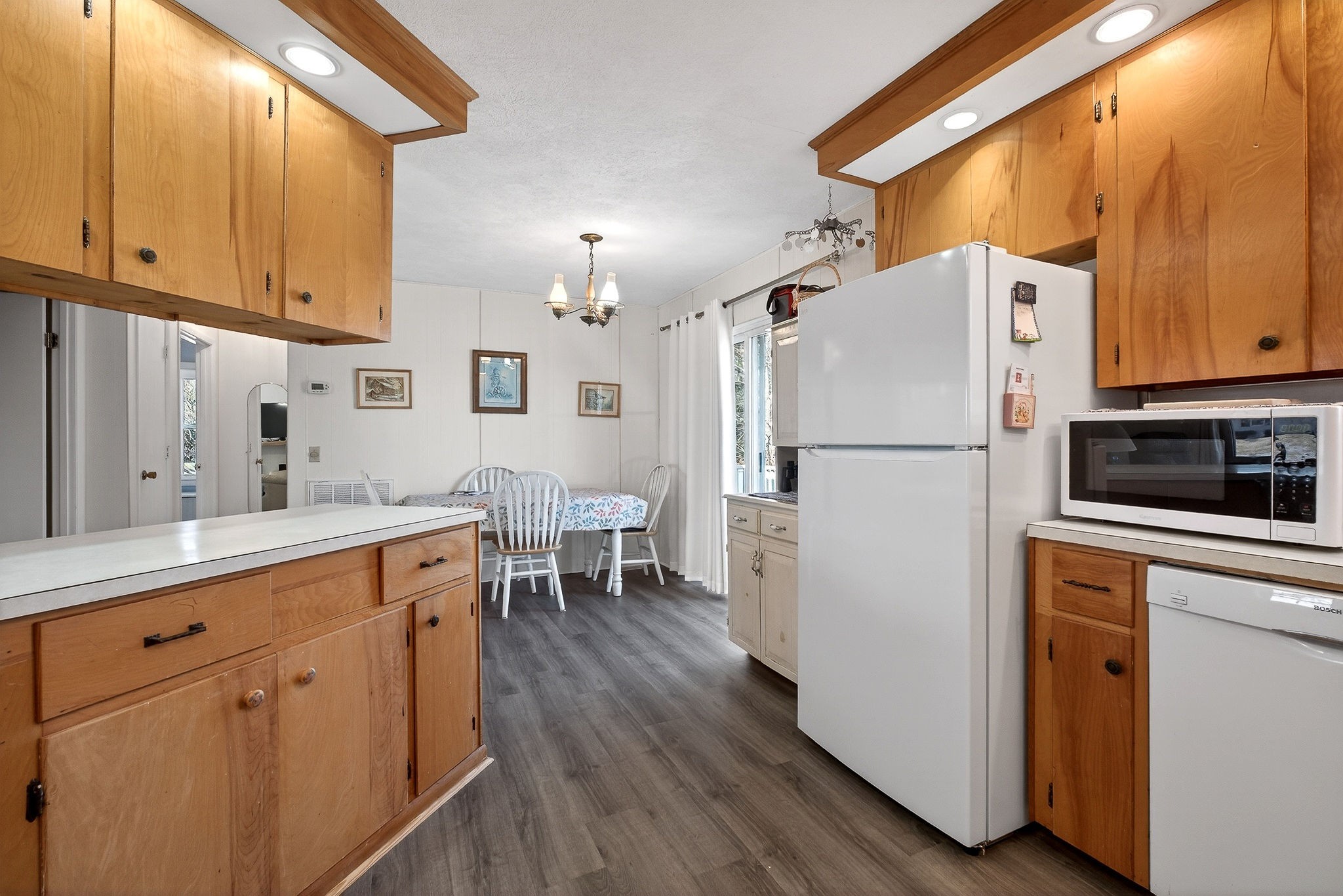 566 Turntable Road Sparta, TN 38583 - Photo 17 of 48 a kitchen with white cabinets and white appliances