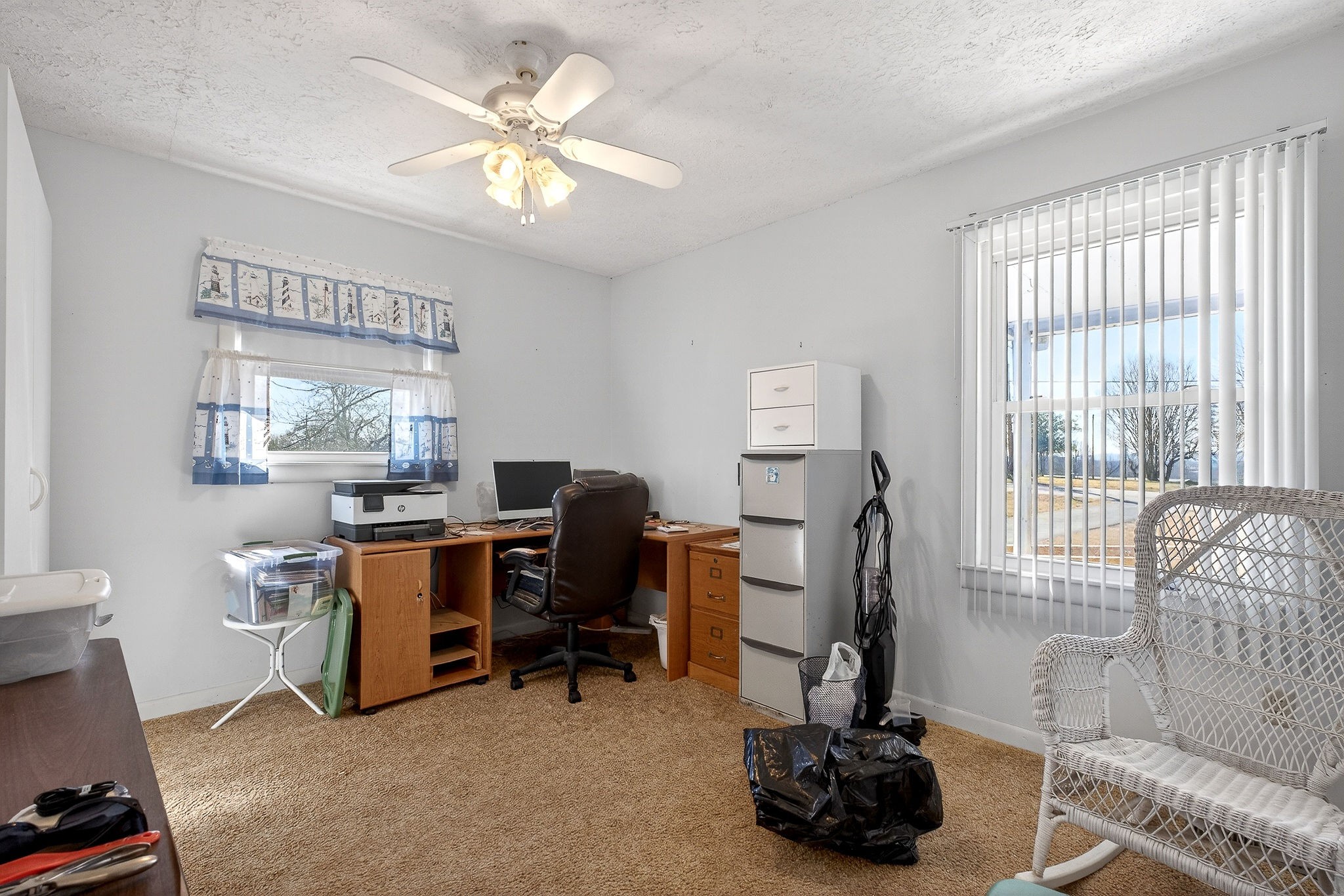 566 Turntable Road Sparta, TN 38583 - Photo 23 of 48 a view of a workspace with furniture and a window
