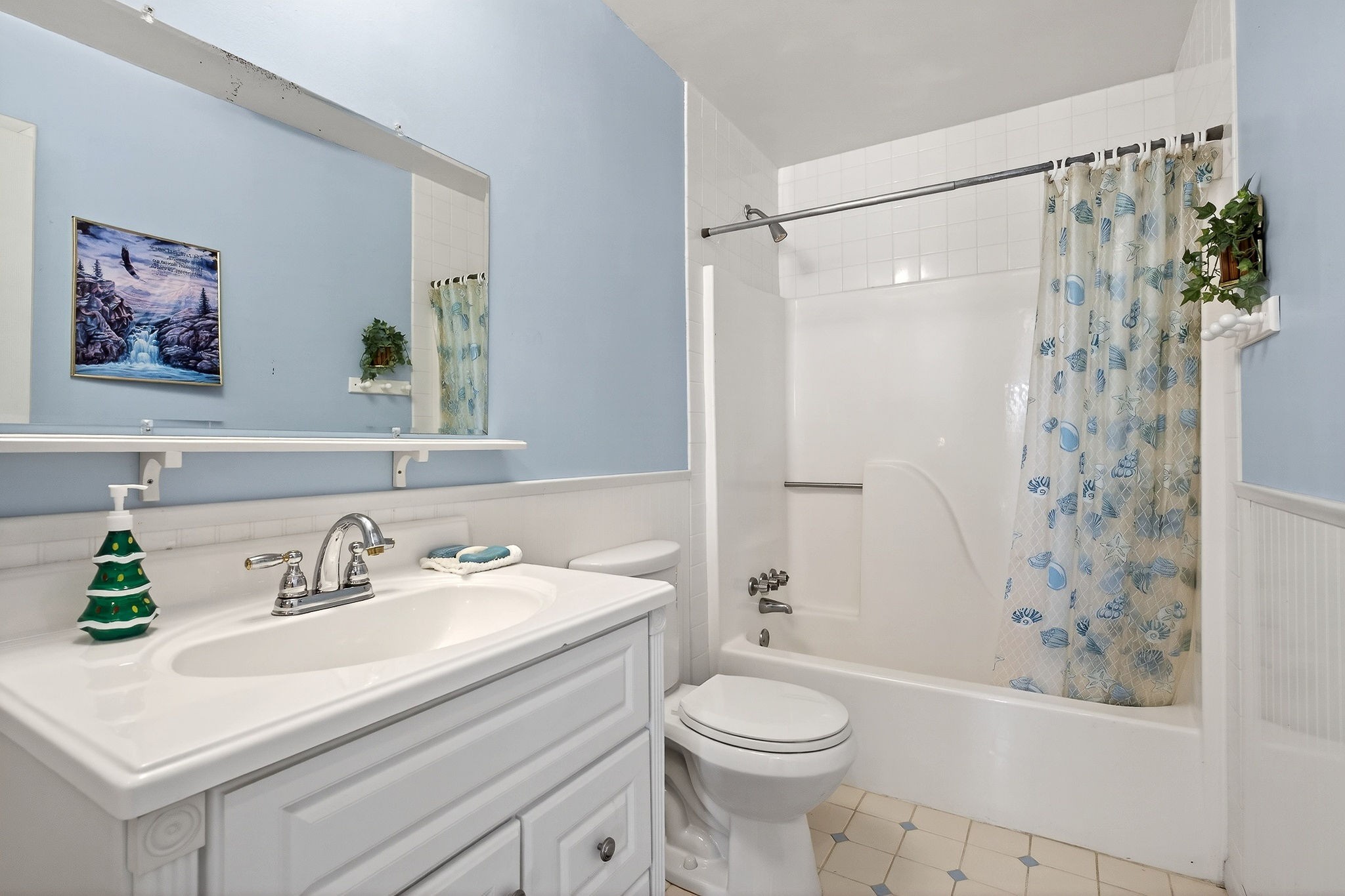 566 Turntable Road Sparta, TN 38583 - Photo 27 of 48 a bathroom with a sink a toilet and shower