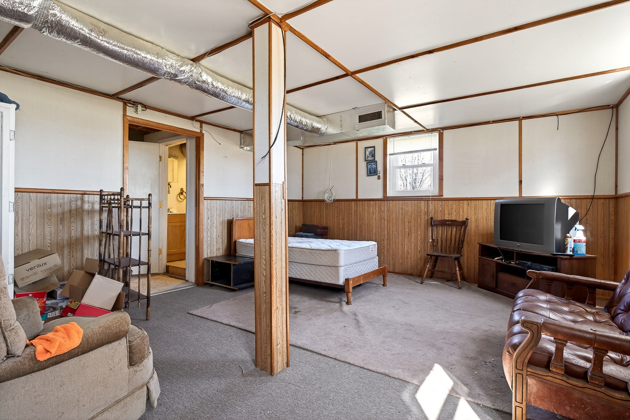 566 Turntable Road Sparta, TN 38583 - Photo 30 of 48 a living room with furniture and a flat screen tv