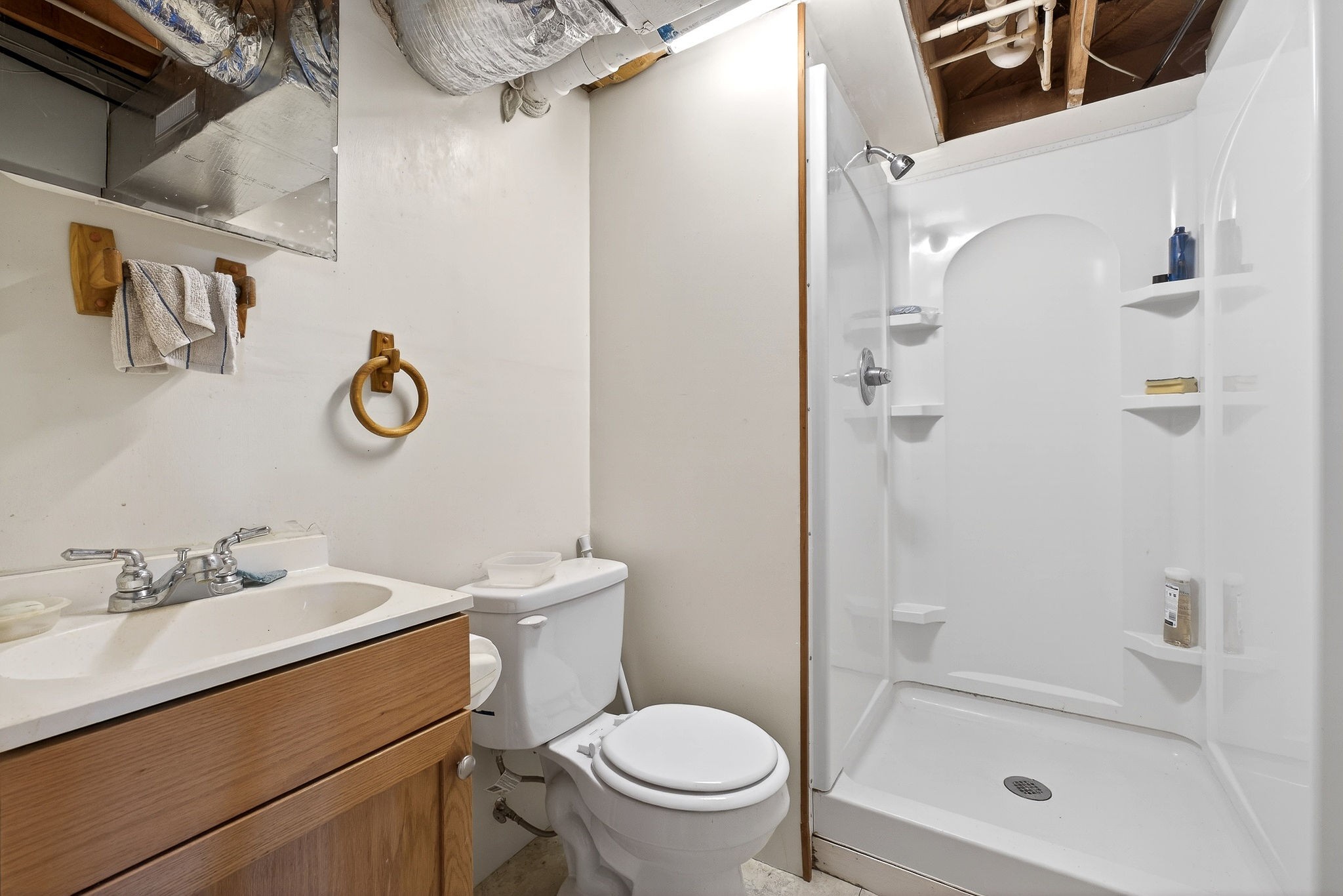 566 Turntable Road Sparta, TN 38583 - Photo 32 of 48 a bathroom with a sink toilet and shower