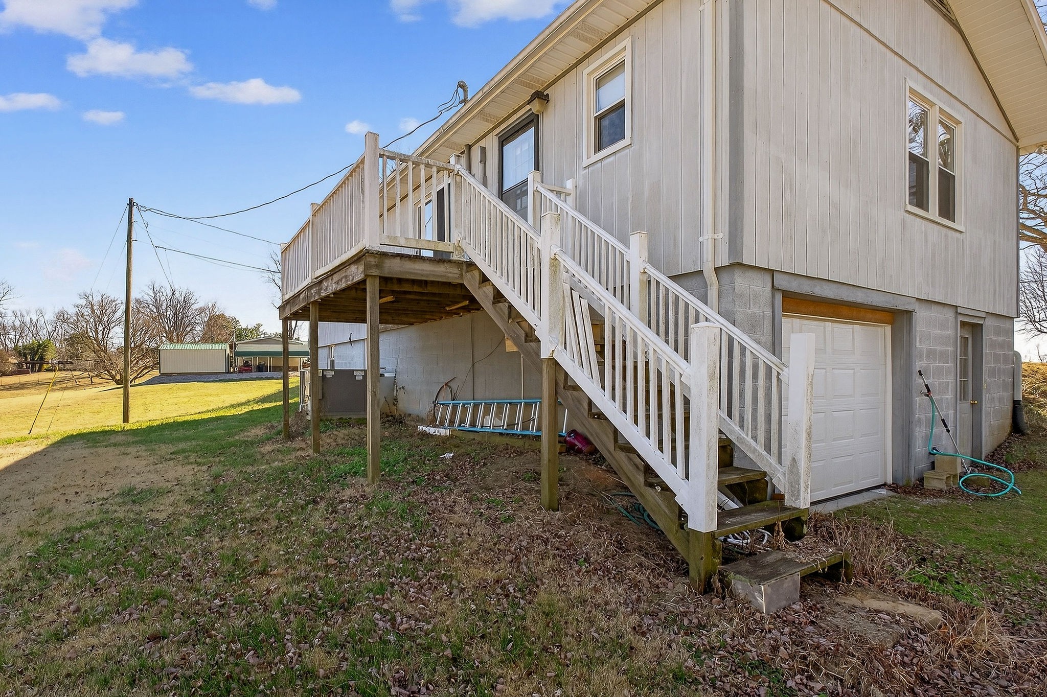 566 Turntable Road Sparta, TN 38583 - Photo 42 of 48 a view of a house with a yard