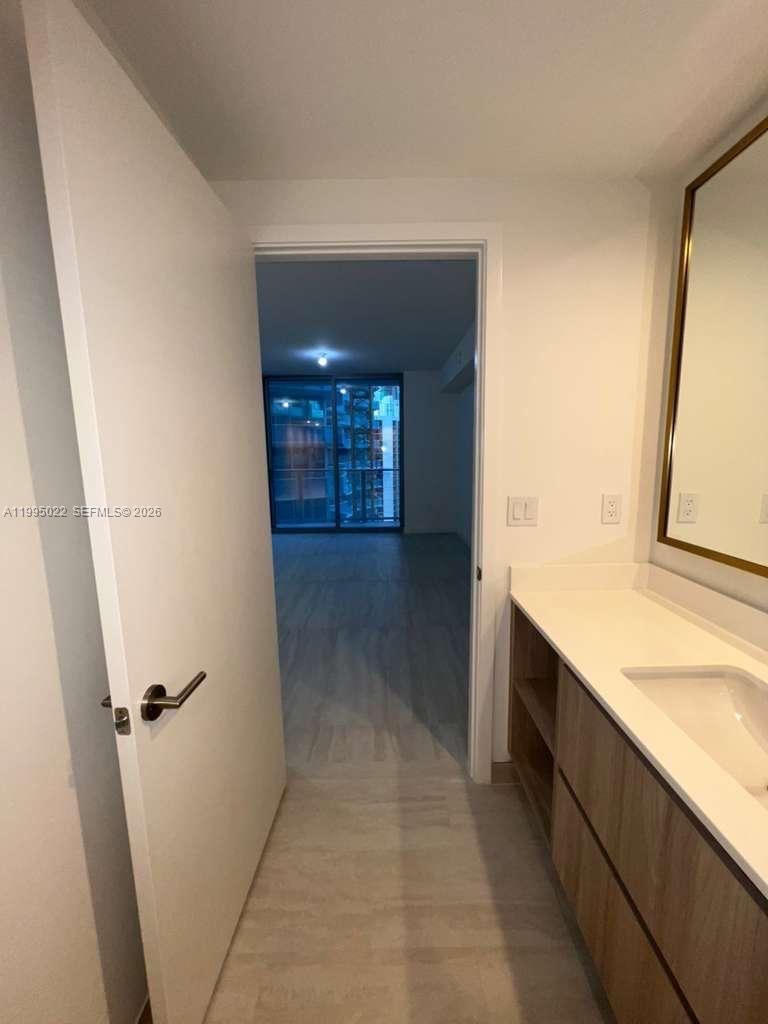 77 Southeast 5th, Unit 2004 Miami, FL 32311 - Photo 14 of 32 a view of a hallway view with staircase