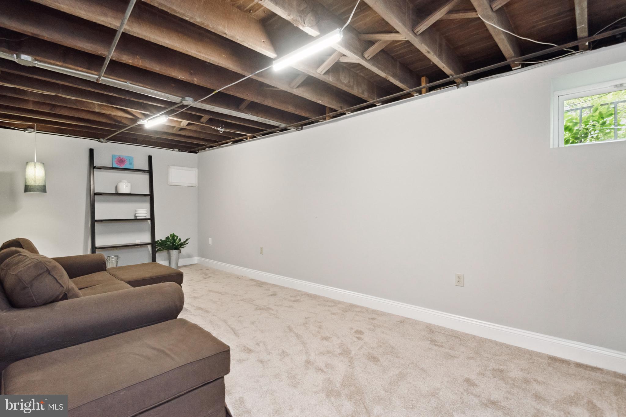 827 Cedarcroft Road Baltimore, MD 21212 - Photo 19 of 29 Comfortable finished basement space! New Carpet!