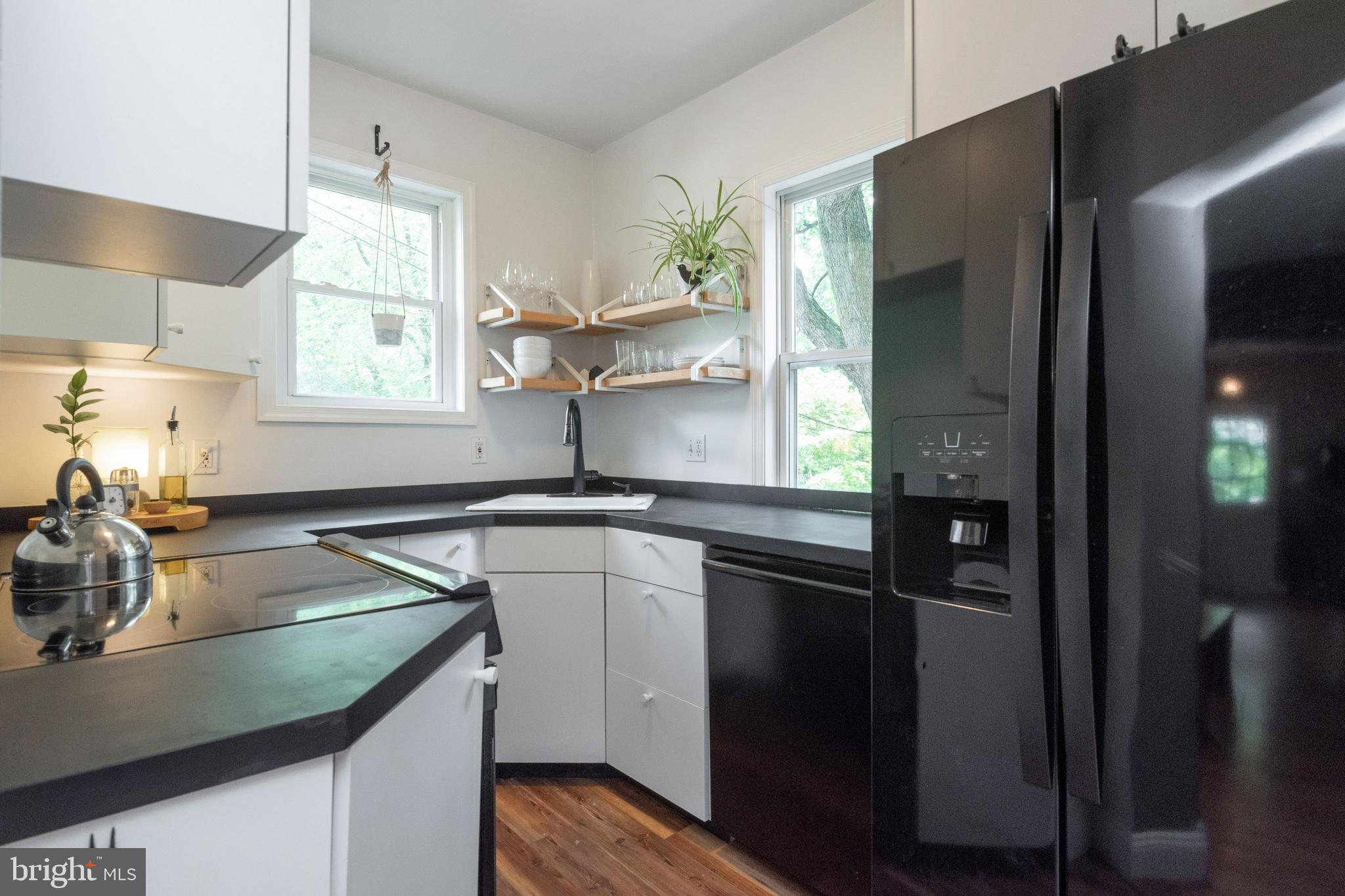 827 Cedarcroft Road Baltimore, MD 21212 - Photo 10 of 29 Galley kitchen with updated appliances