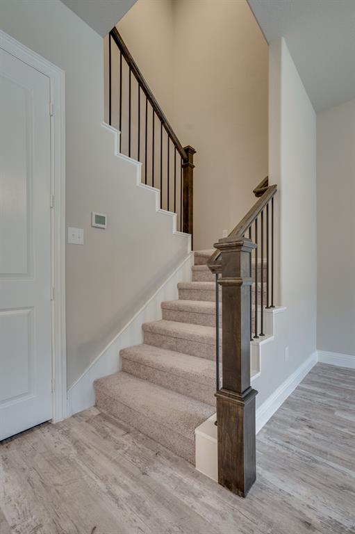 6217 Rainbow Valley Place Frisco, TX 75035 - Photo 18 of 30 a view of entryway and hall with wooden floor
