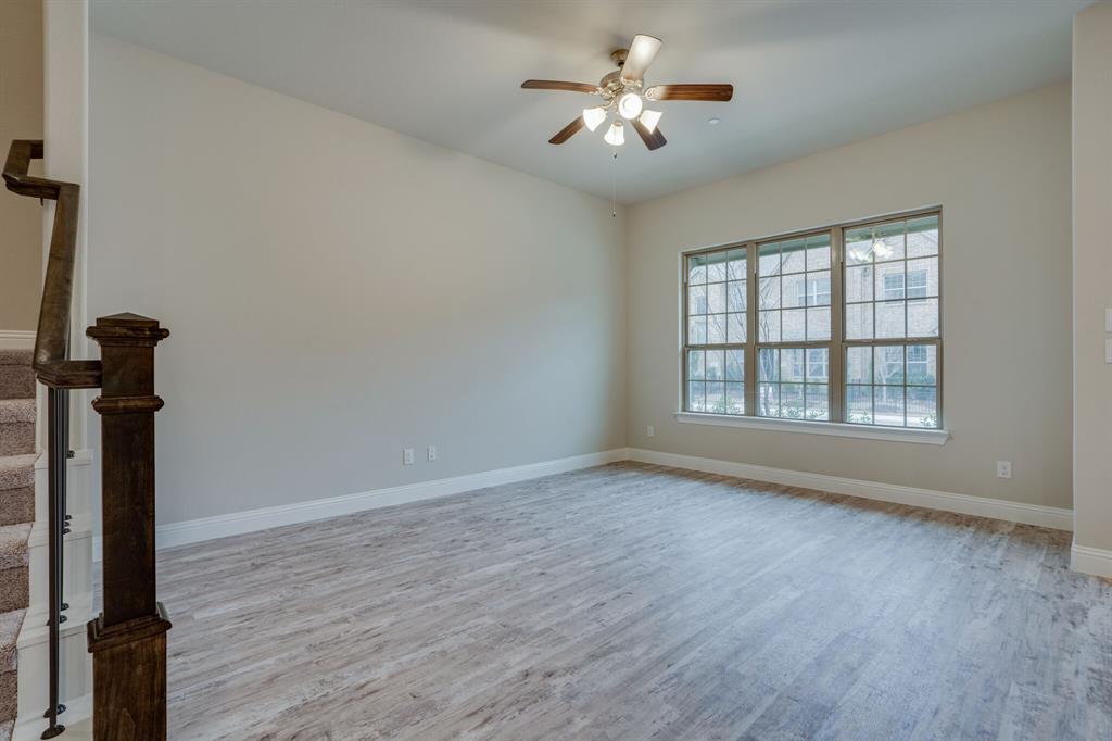 6217 Rainbow Valley Place Frisco, TX 75035 - Photo 6 of 30 a view of empty room with wooden floor and fan
