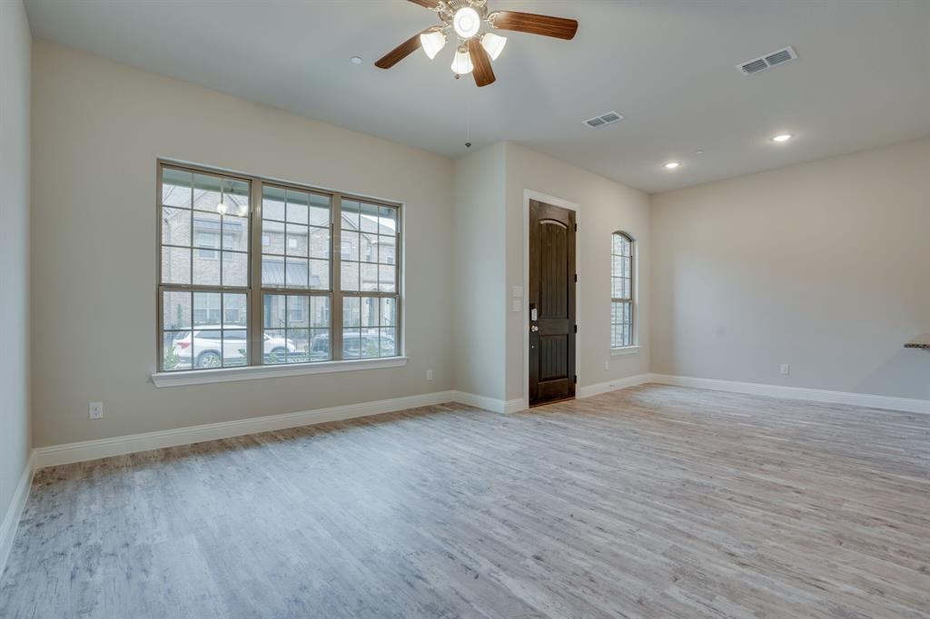 6217 Rainbow Valley Place Frisco, TX 75035 - Photo 7 of 30 wooden floor in an empty room with a window