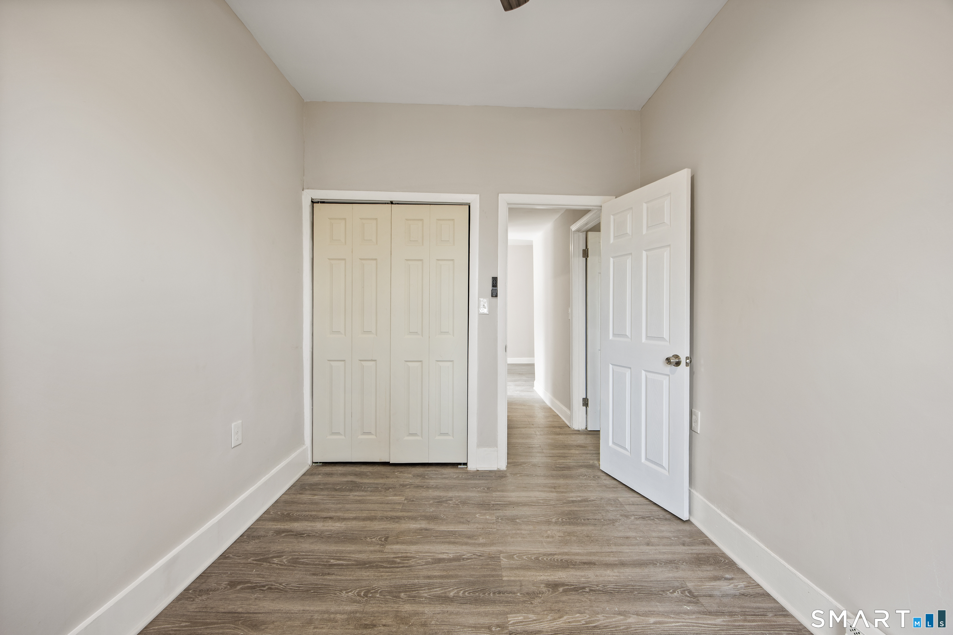 465 Washington Avenue Waterbury, CT 06708 - Photo 21 of 34 a view of a hallway with wooden floor