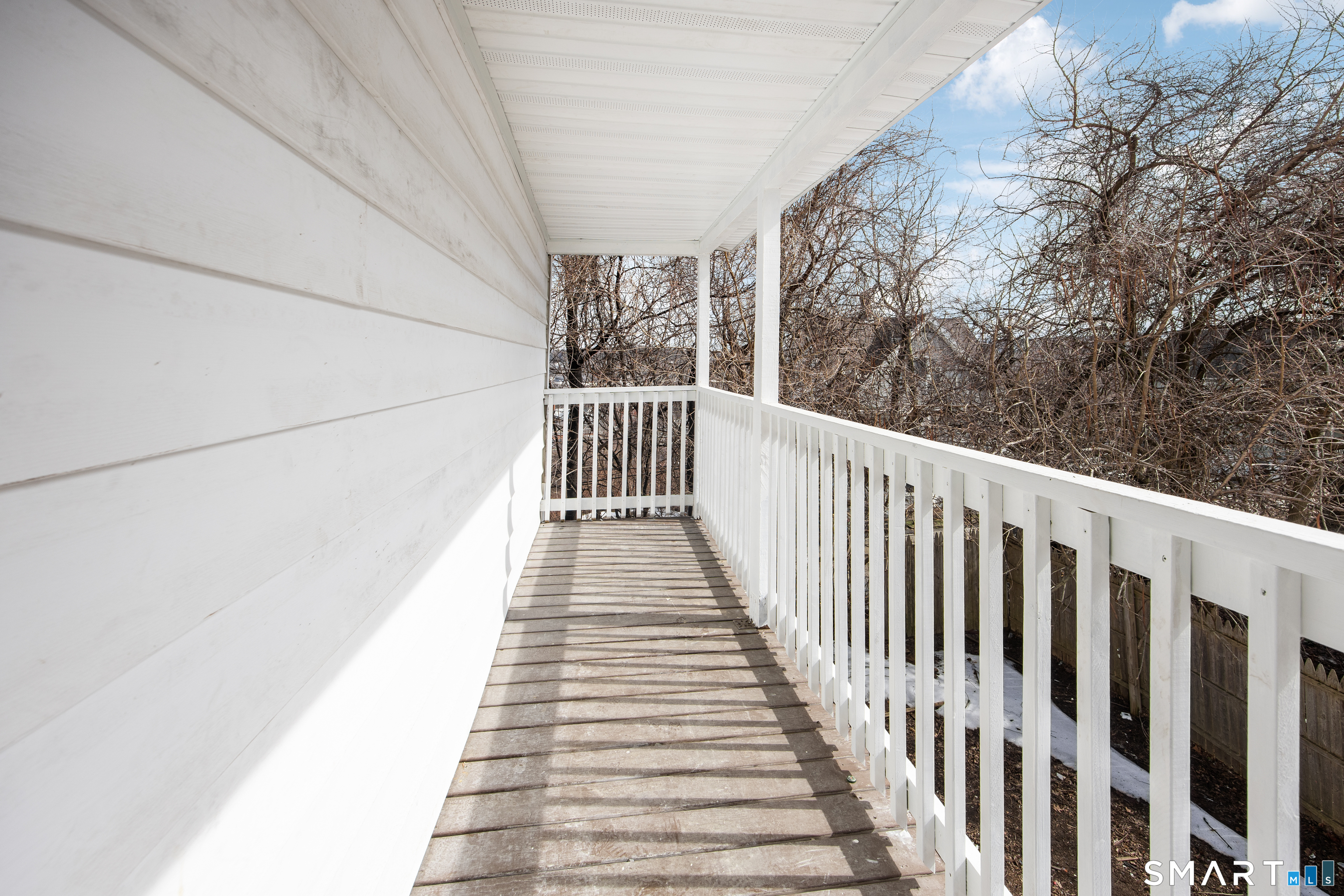 465 Washington Avenue Waterbury, CT 06708 - Photo 31 of 34 a view of a balcony with wooden floor