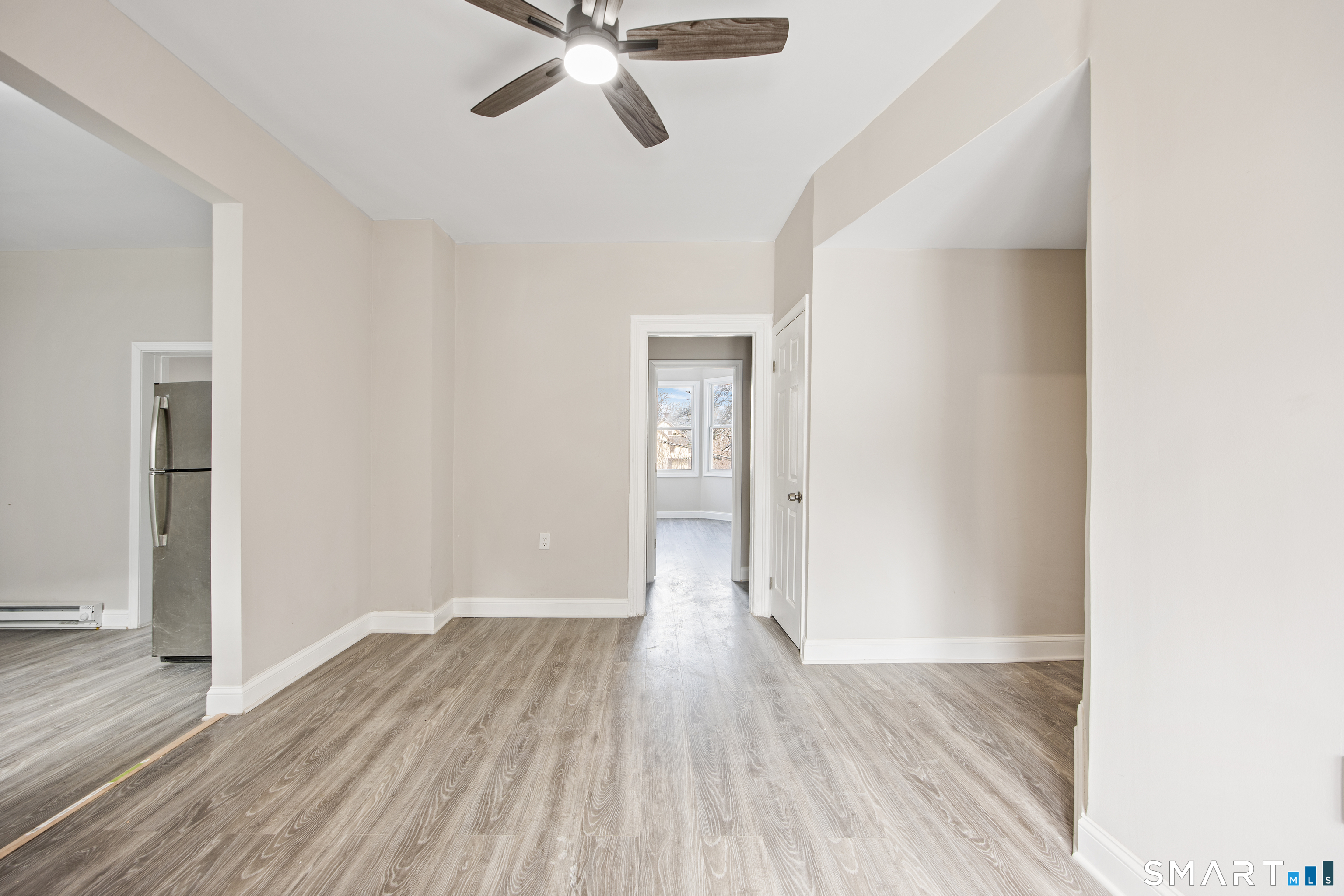 465 Washington Avenue Waterbury, CT 06708 - Photo 9 of 34 a view of empty room with wooden floor
