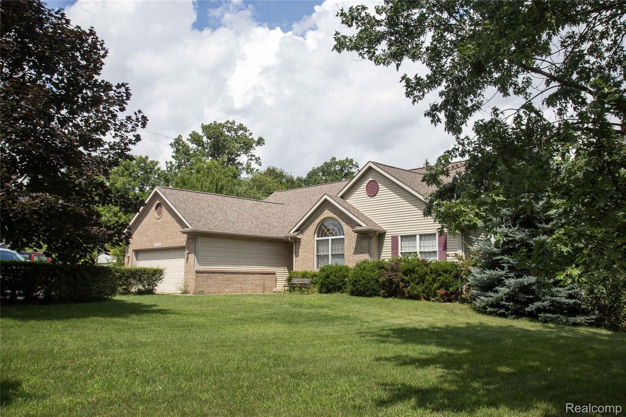 5600 West Coon Lake Road Howell, MI 48843 - Photo 2 of 22 front1.jpg