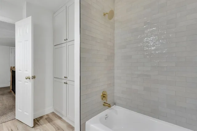 a bathroom with a bathtub