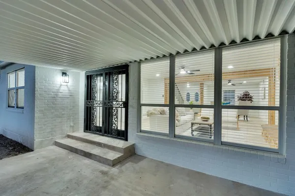 a view of an entryway with a house