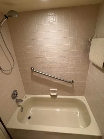 a bed room with a bed and a couch