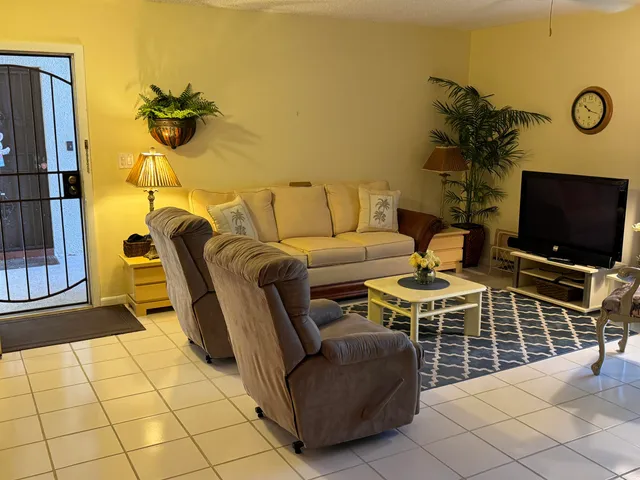 a room with furniture and a window