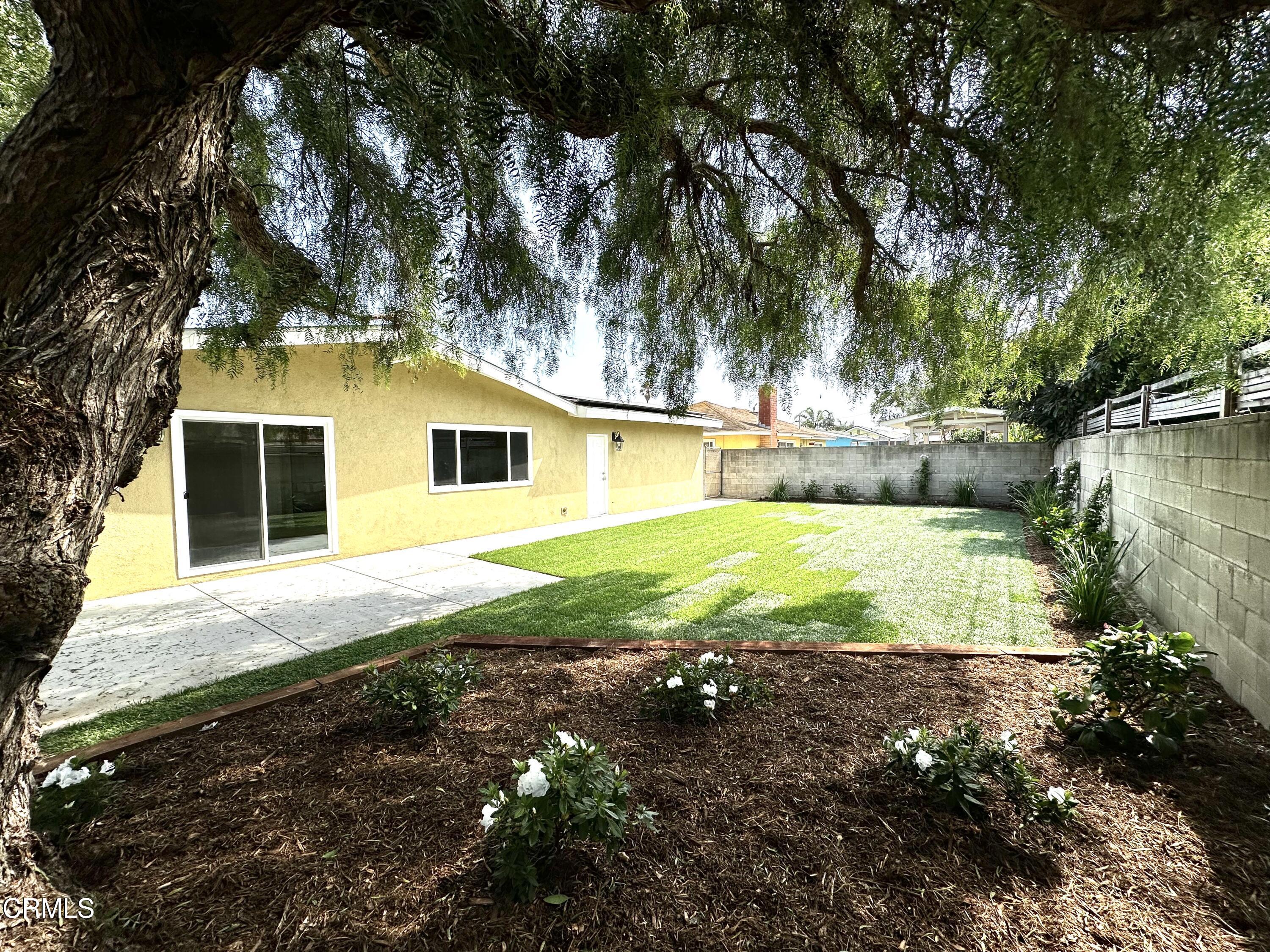 3031 Merced Place Oxnard, CA 93033 - Photo 26 of 26 a view of backyard of house with green space
