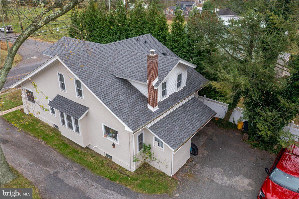 206 Washington Road Princeton, NJ 08540 - Photo 29 of 34 a aerial view of a house with a yard and large trees