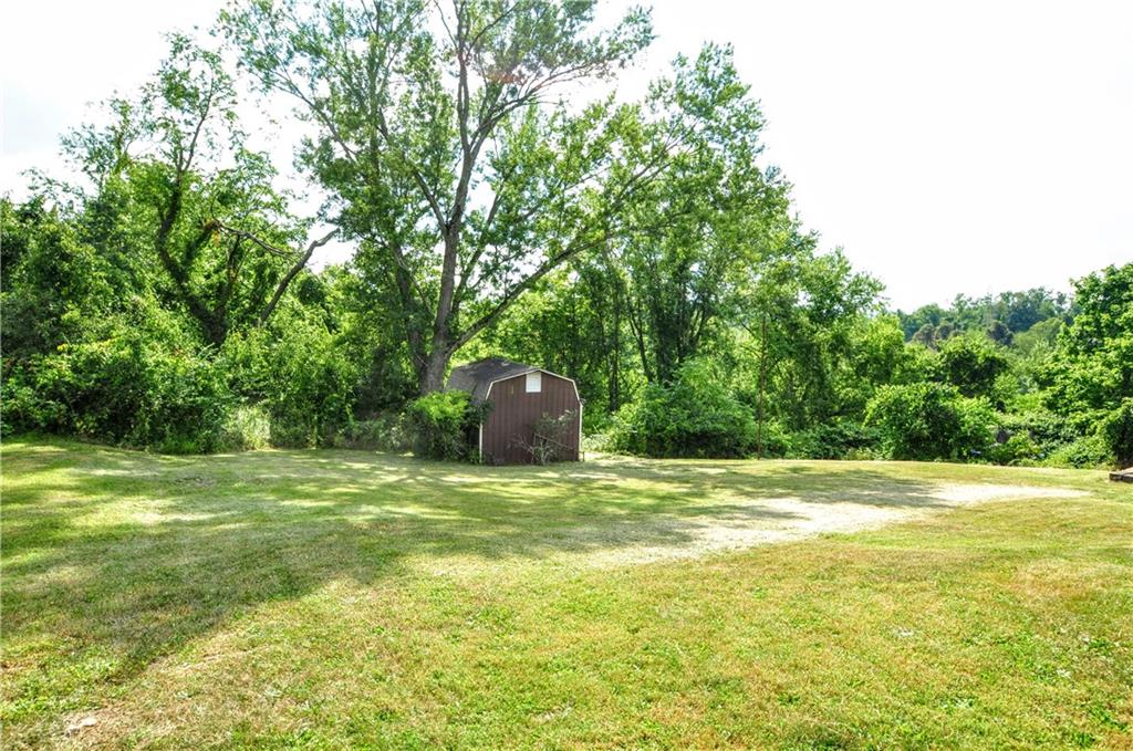 880 Peairs Road Elizabeth, PA 15037 - Photo 18 of 33 a view of a field with a trees in the background