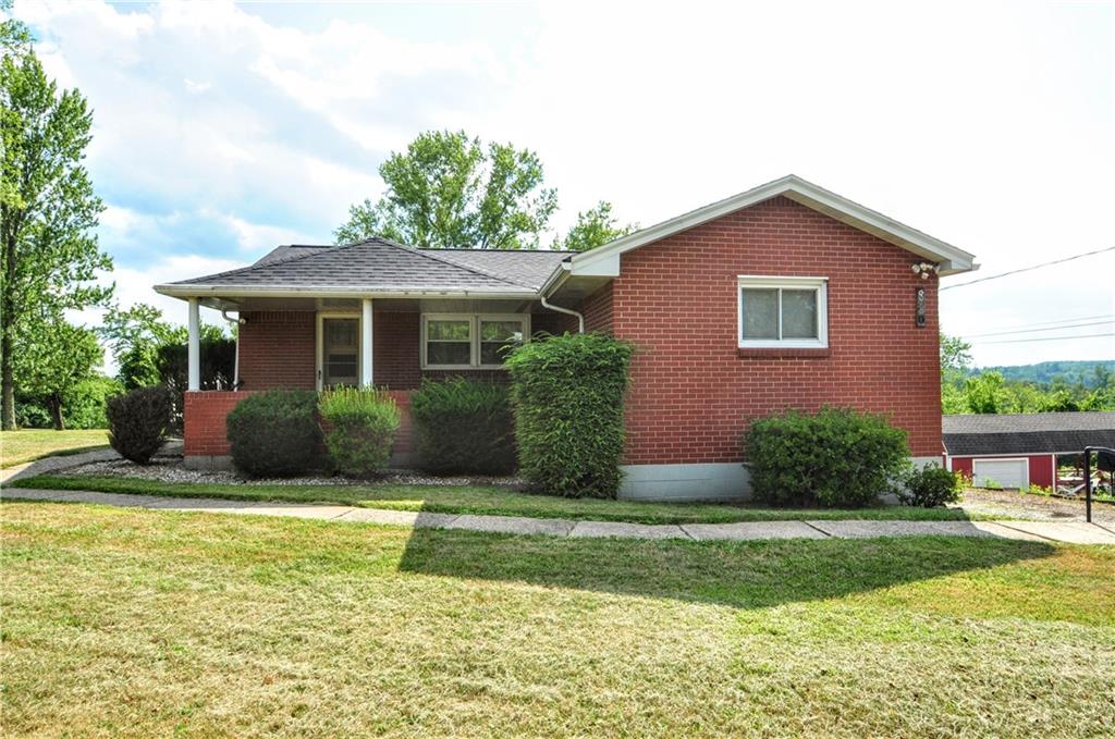 880 Peairs Road Elizabeth, PA 15037 - Photo 2 of 33 a front view of a house with a yard