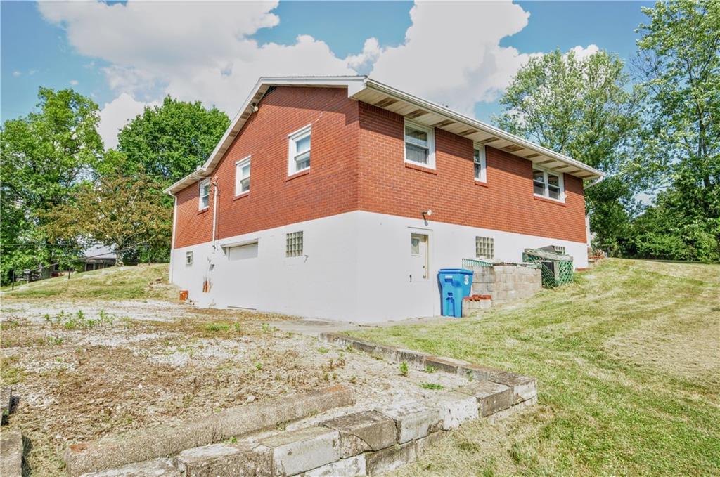880 Peairs Road Elizabeth, PA 15037 - Photo 21 of 33 a front view of a house with a yard