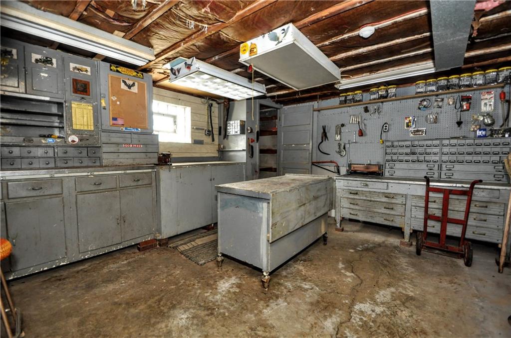 880 Peairs Road Elizabeth, PA 15037 - Photo 32 of 33 a utility room with cabinets dryer and washer