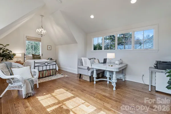 a view of a livingroom with furniture and window
