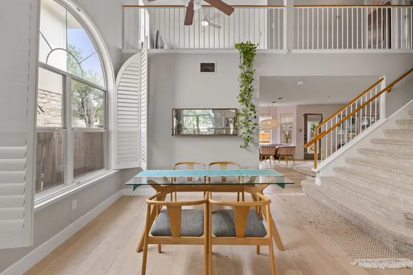 a living room with furniture and a table