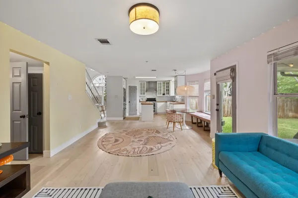 a living room with furniture and a table
