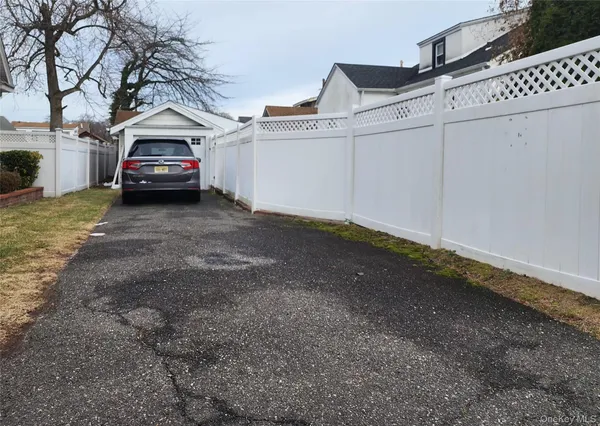 a car parked in front of a house