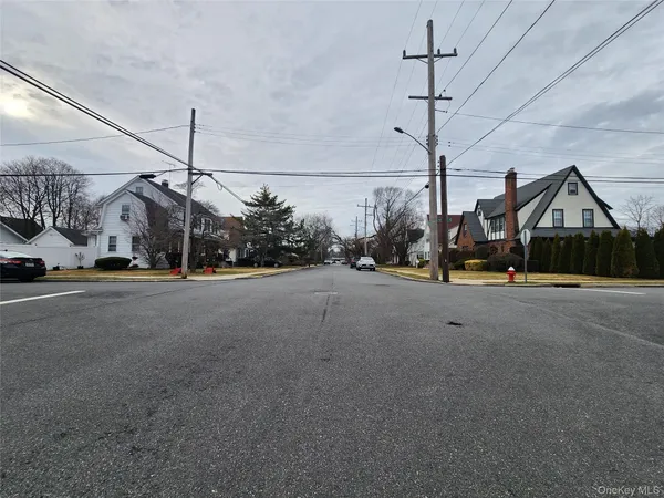a view of a street with cars