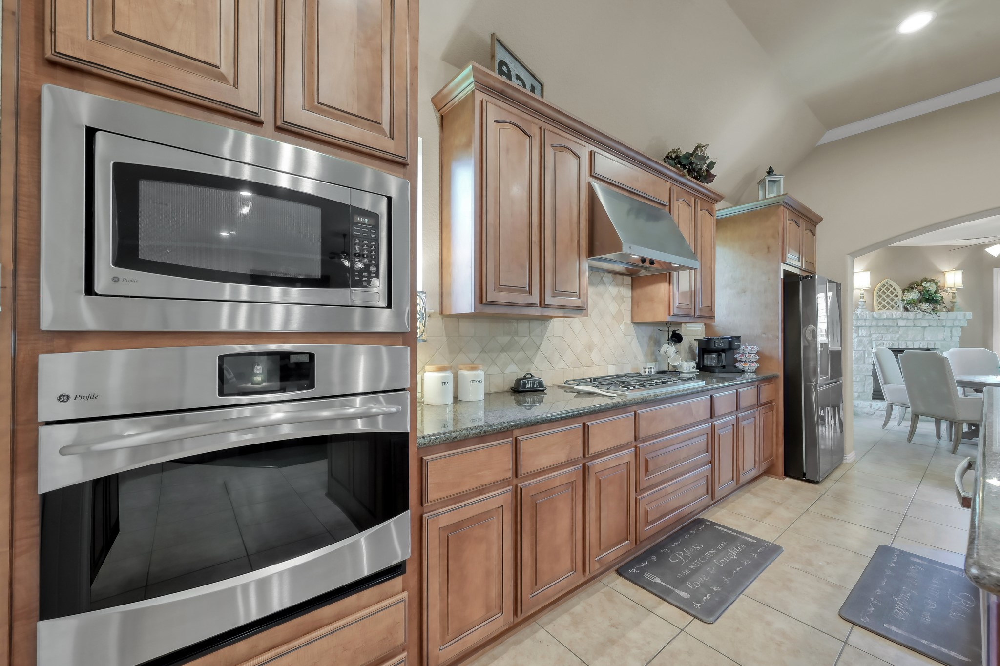 2406 Randal Point Court Spring, TX 77388 - Photo 12 of 45 Lots of cabinets for storage and a gas cooktop stove.