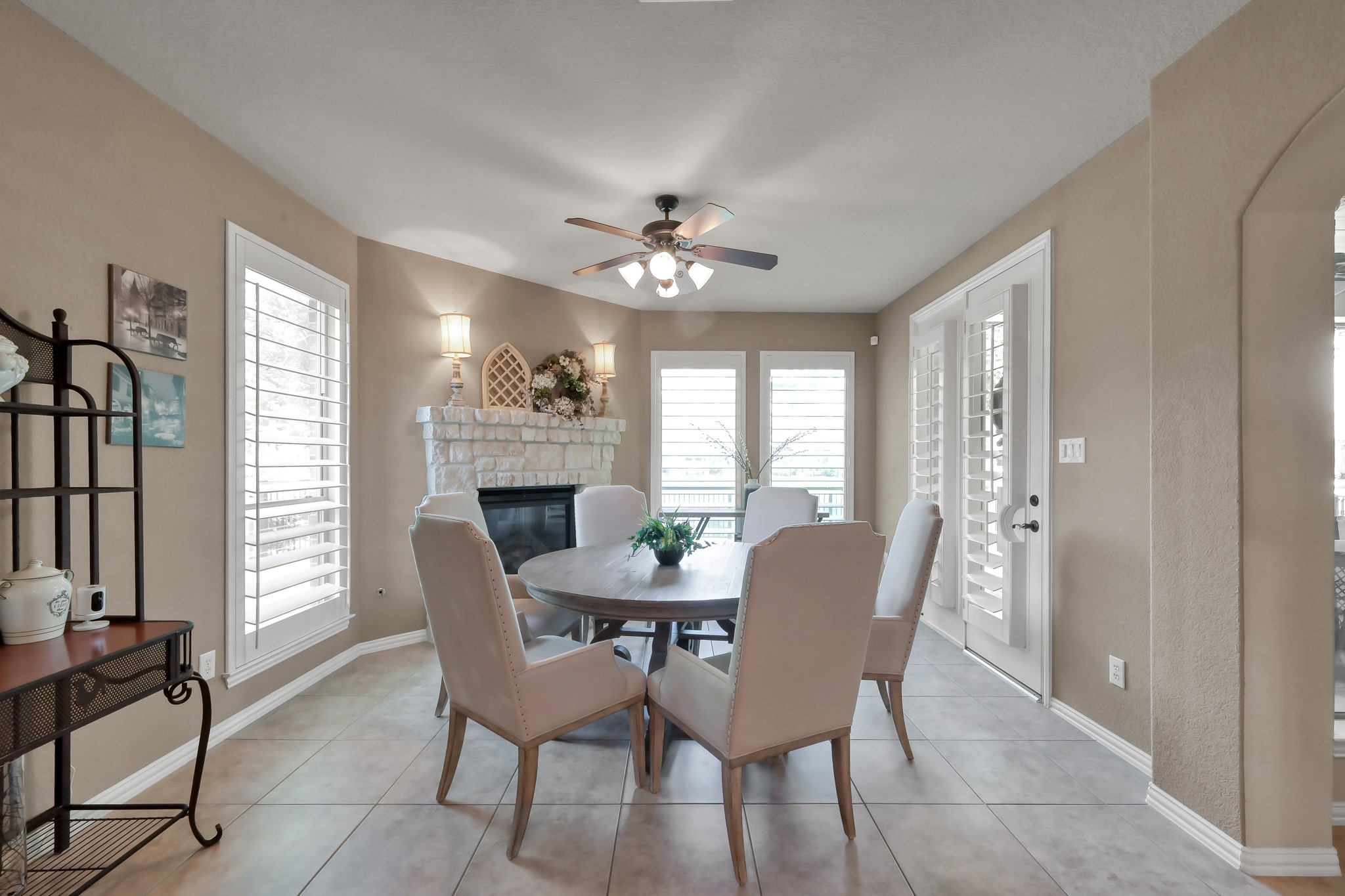 2406 Randal Point Court Spring, TX 77388 - Photo 16 of 45 Den used as a breakfast room with a second fireplace.