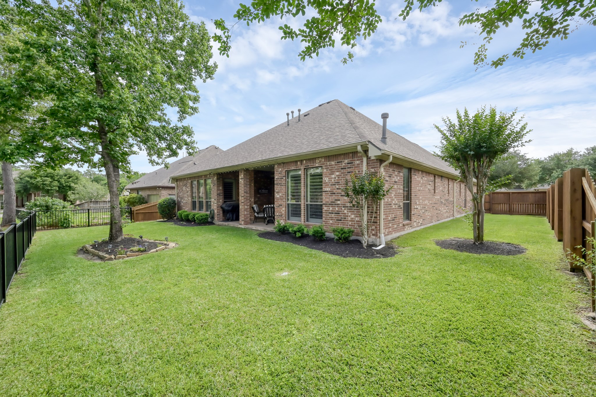2406 Randal Point Court Spring, TX 77388 - Photo 35 of 45 View of backyard from the lake