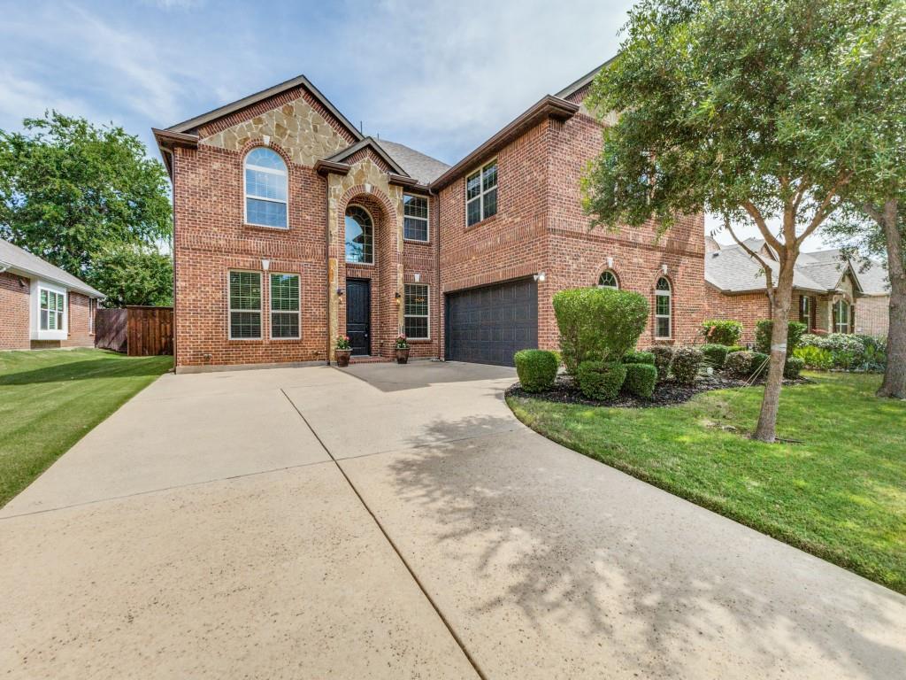 916 Redbird Lane Allen, TX 75013 - Photo 1 of 28 Handsome and striking curb appeal with brick and stone facade.