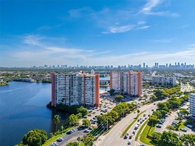 a view of a city and lake