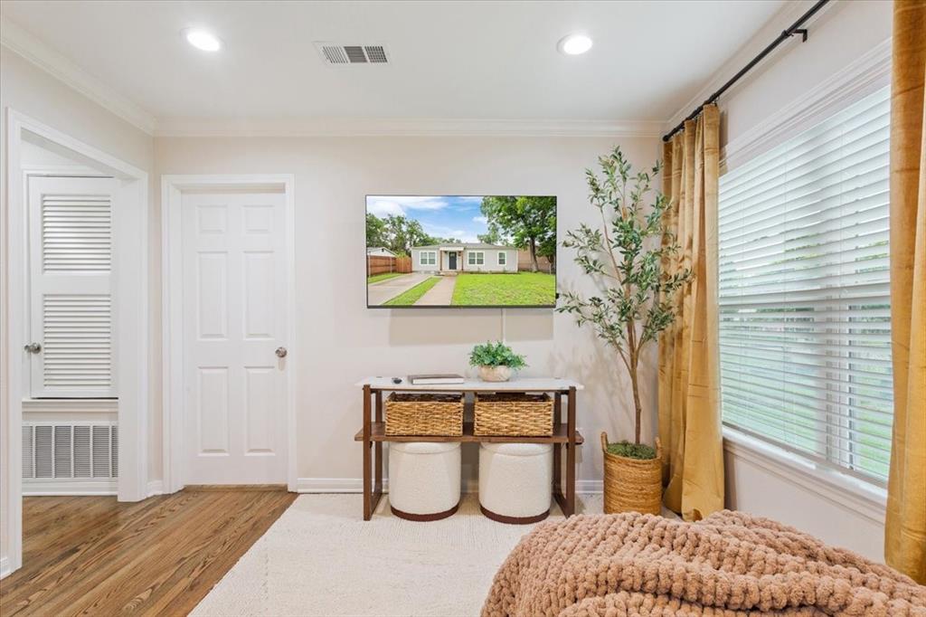 Undisclosed Address Waco, TX 76708 - Photo 5 of 30 Sitting room with wood finished floors, ornamental molding, and recessed lighting