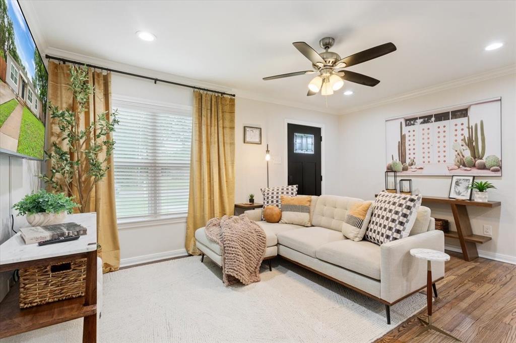 Undisclosed Address Waco, TX 76708 - Photo 7 of 30 Living area featuring ceiling fan, ornamental molding, wood finished floors, and recessed lighting