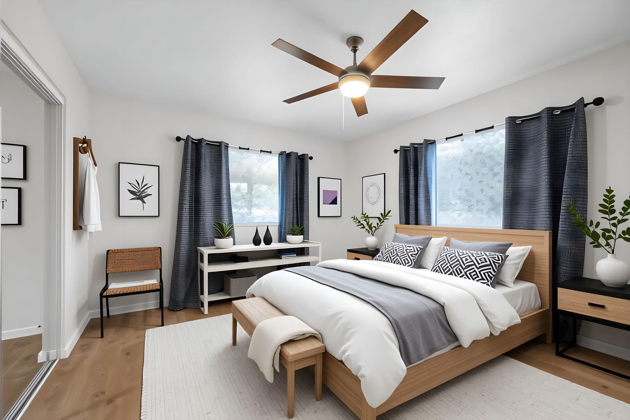 1702 Haiku Road, Unit B Haiku, HI 96708 - Photo 21 of 43 a bedroom with a large bed and a large window