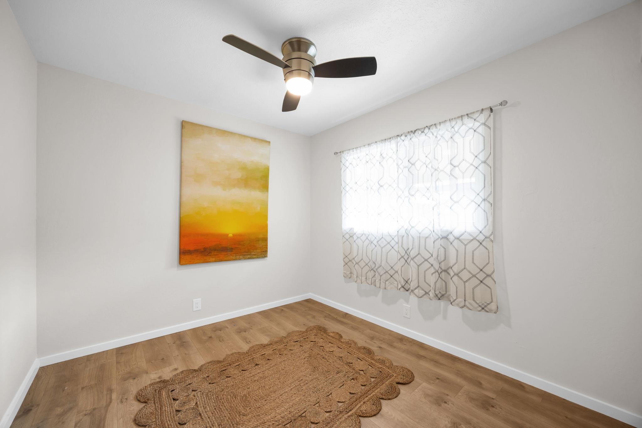 1702 Haiku Road, Unit B Haiku, HI 96708 - Photo 24 of 43 a view of an empty room and window