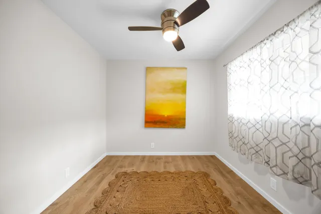 an empty room with windows