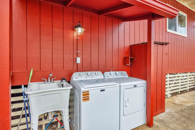 a utility room with dryer and washer