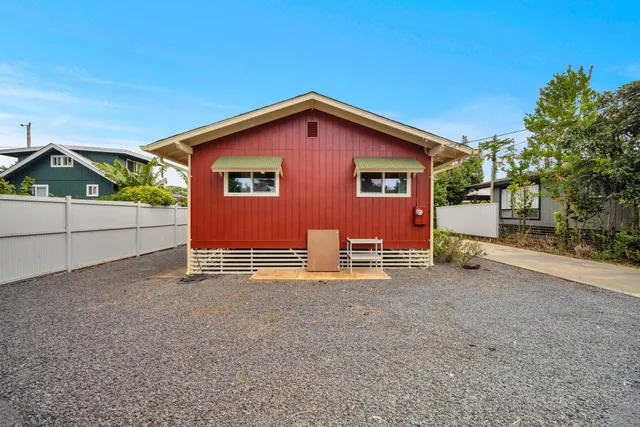 a view of a house with a yard and garage