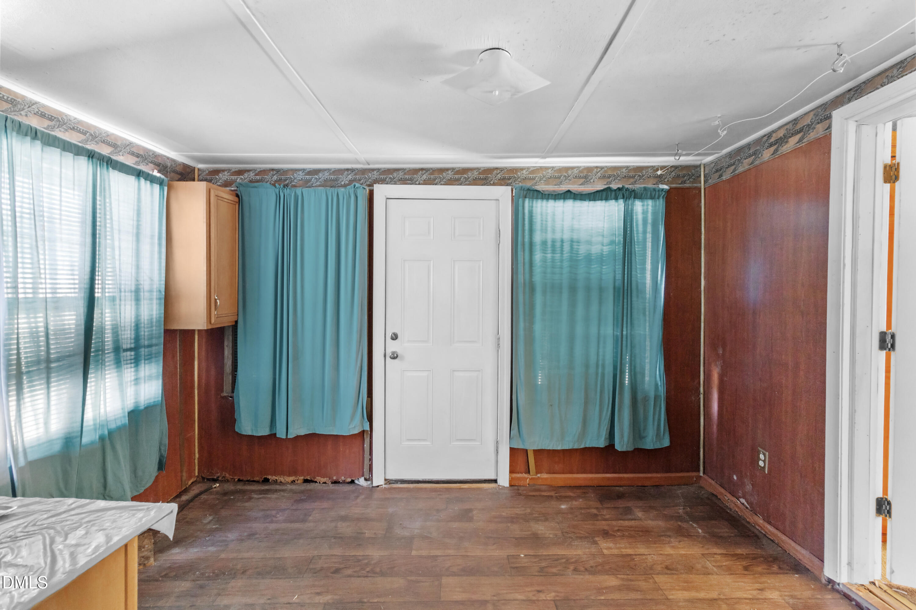 101 Doby Drive Raeford, NC 28376 - Photo 13 of 22 an empty room with closet and windows