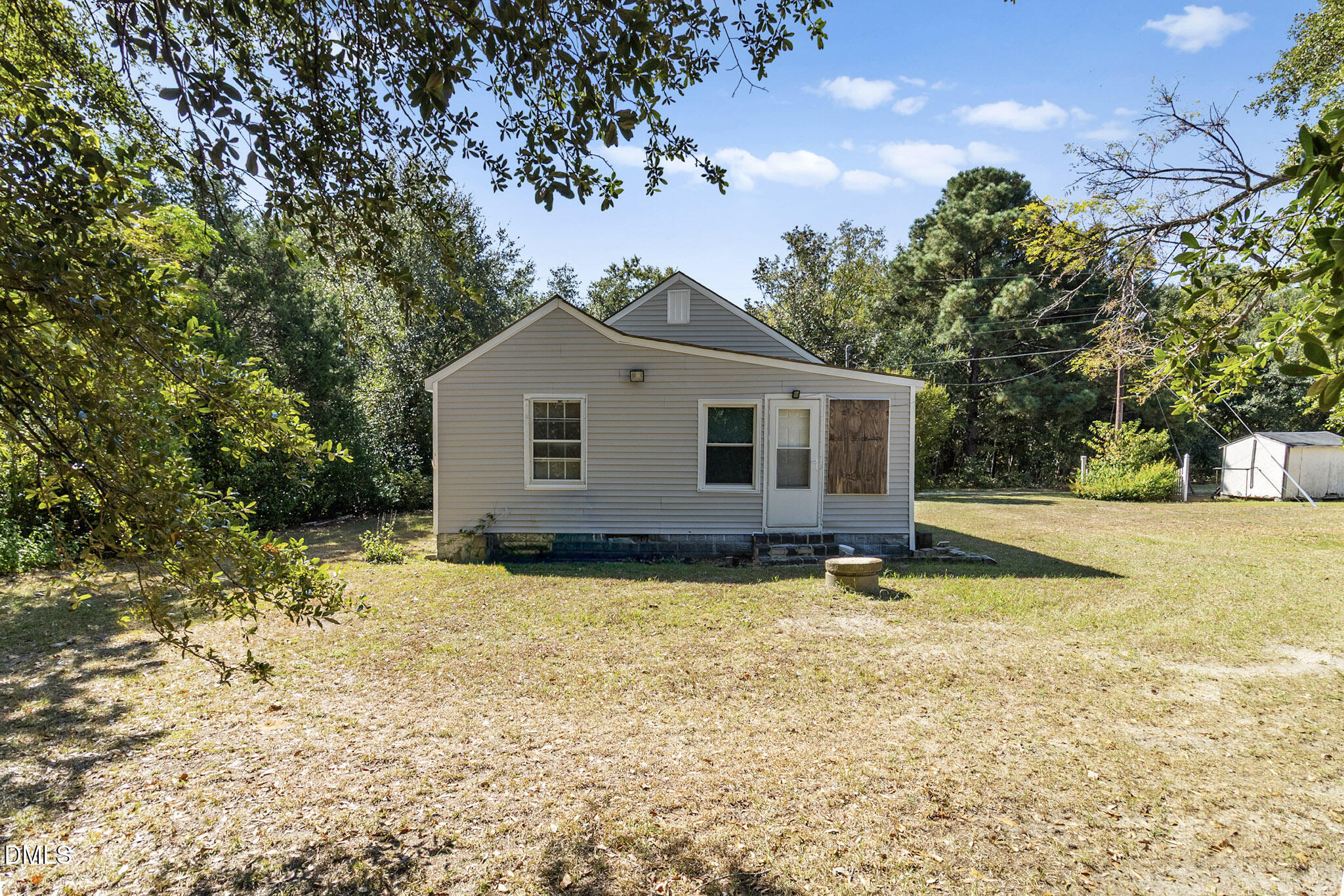 101 Doby Drive Raeford, NC 28376 - Photo 20 of 22 a view of a house with a yard